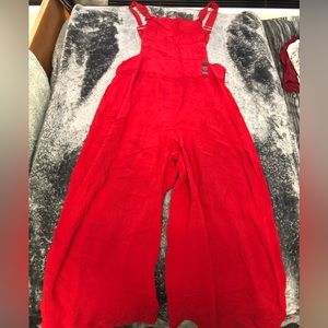 bright red jumpsuit